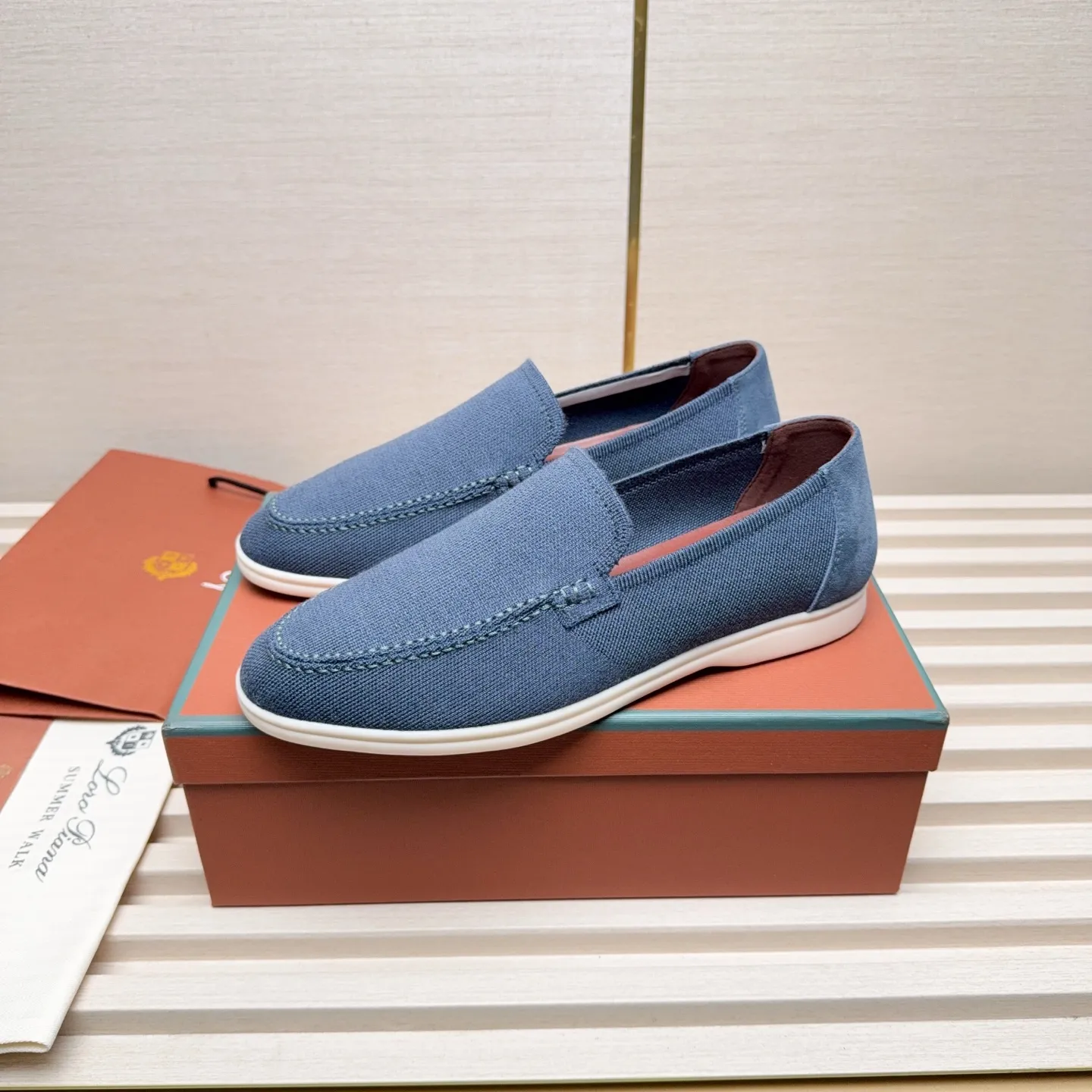 Men's Men's Shoes 💰400 Loro PIana moccasins are made of wish wool fabric. The upper is made of knitted fabric, made on a loom, and then attached to a rubber sole. The Rain System's water-repellent treatment enhances the shoe's functional design, while the suede details give the shoe a sense of elegance and sophistication. Made from Wish, fine wool from Australian and New Zealand Merino sheep